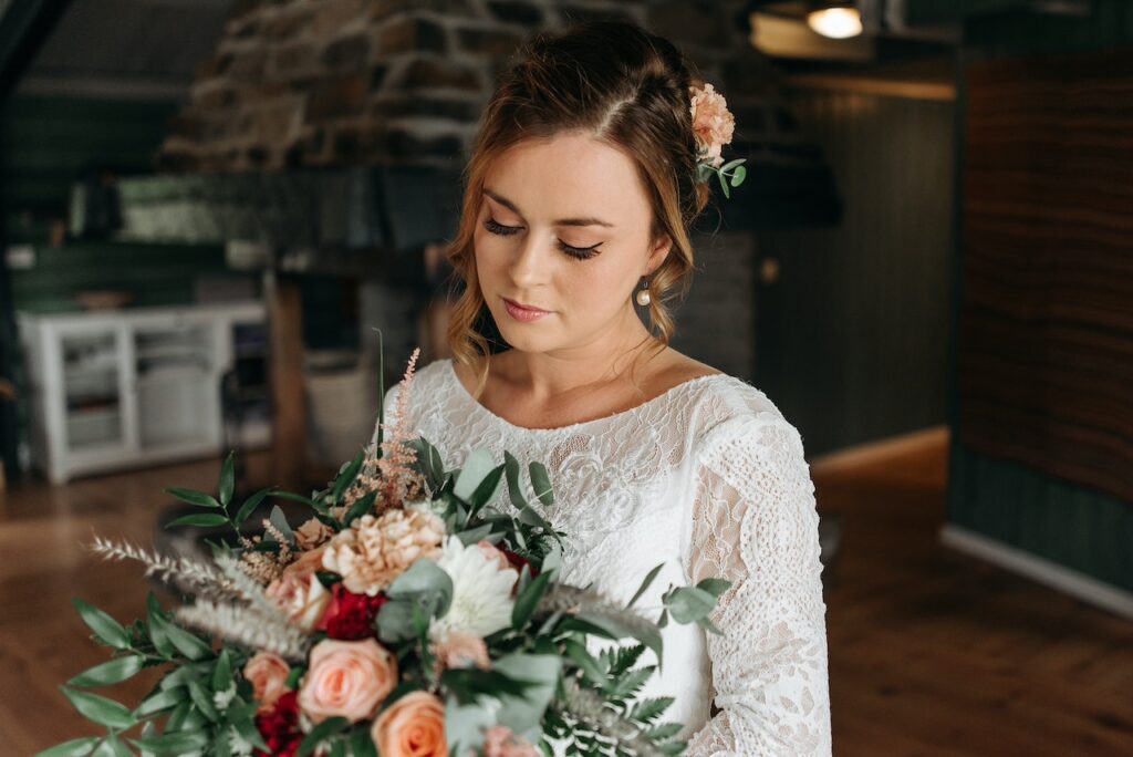 A lady wearing a wedding dress