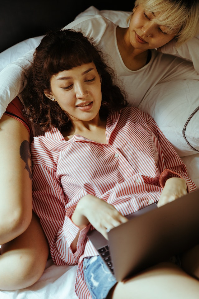 Two girls in bed; lesbian