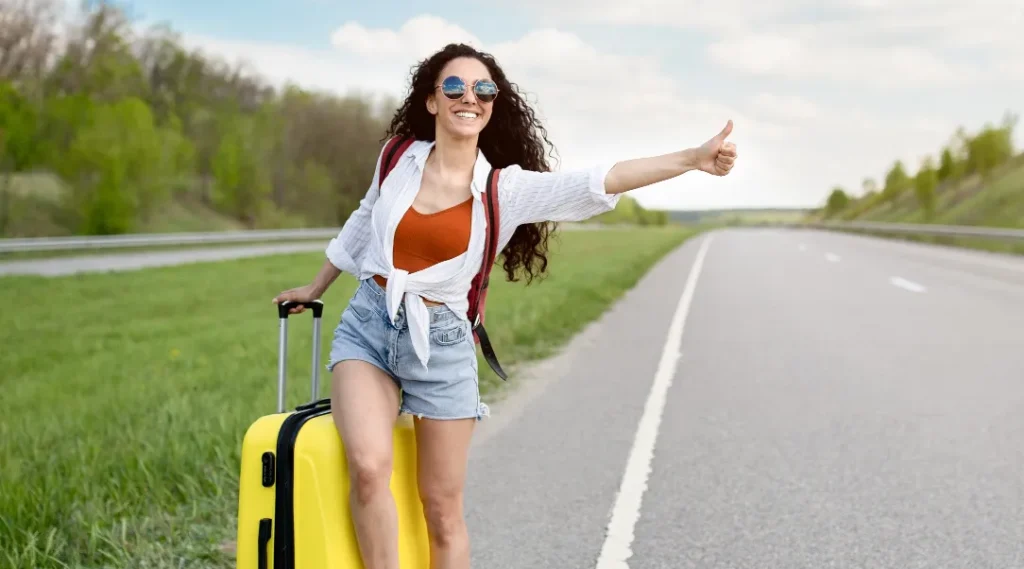 A beautiful young lady Hitchhiking